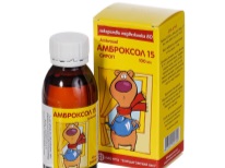 Ambroxol for treating wet cough in a child