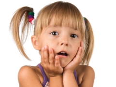 Brown plaque on the teeth of a child