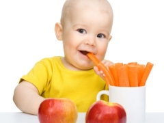 What foods can be eaten raw to children and at what age should we start feeding them?