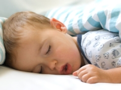 Why does a child snore in a dream and what to do?