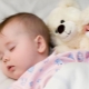 When do children start sleeping all night without waking up?