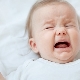 Why does a baby cry or scream in a dream?