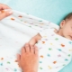 Libre y apretado swaddling: ¿Cuál es la diferencia y qué es mejor?