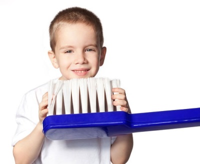 Baby with toothbrush