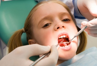 Girl at the dentist