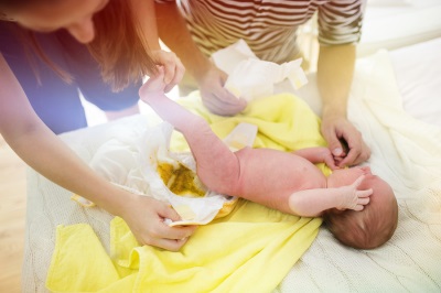 Collecting feces from a baby diaper