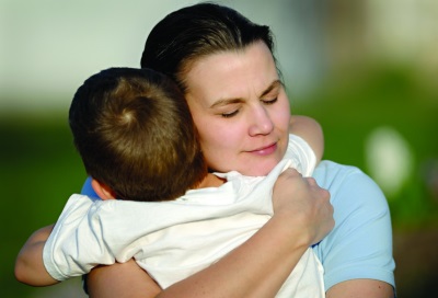 Mom hugs son