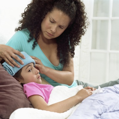 Mom with her daughter who is sick