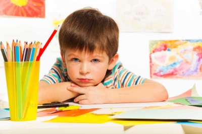 Schoolboy at his desk