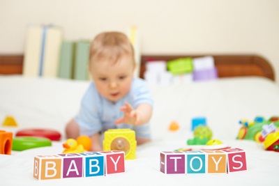 6 months old baby playing cubes