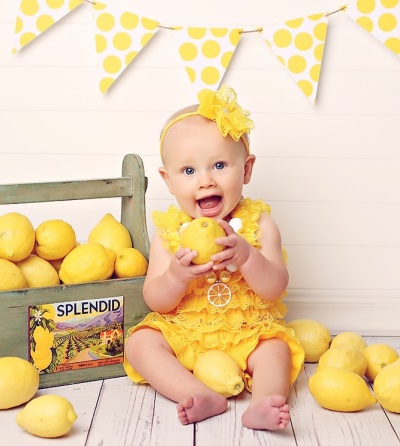 Baby with lemon