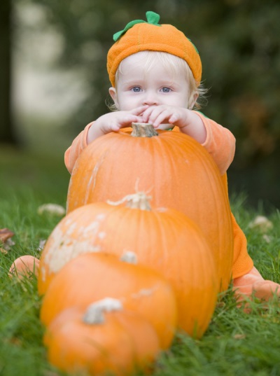 Baby and pumpkin